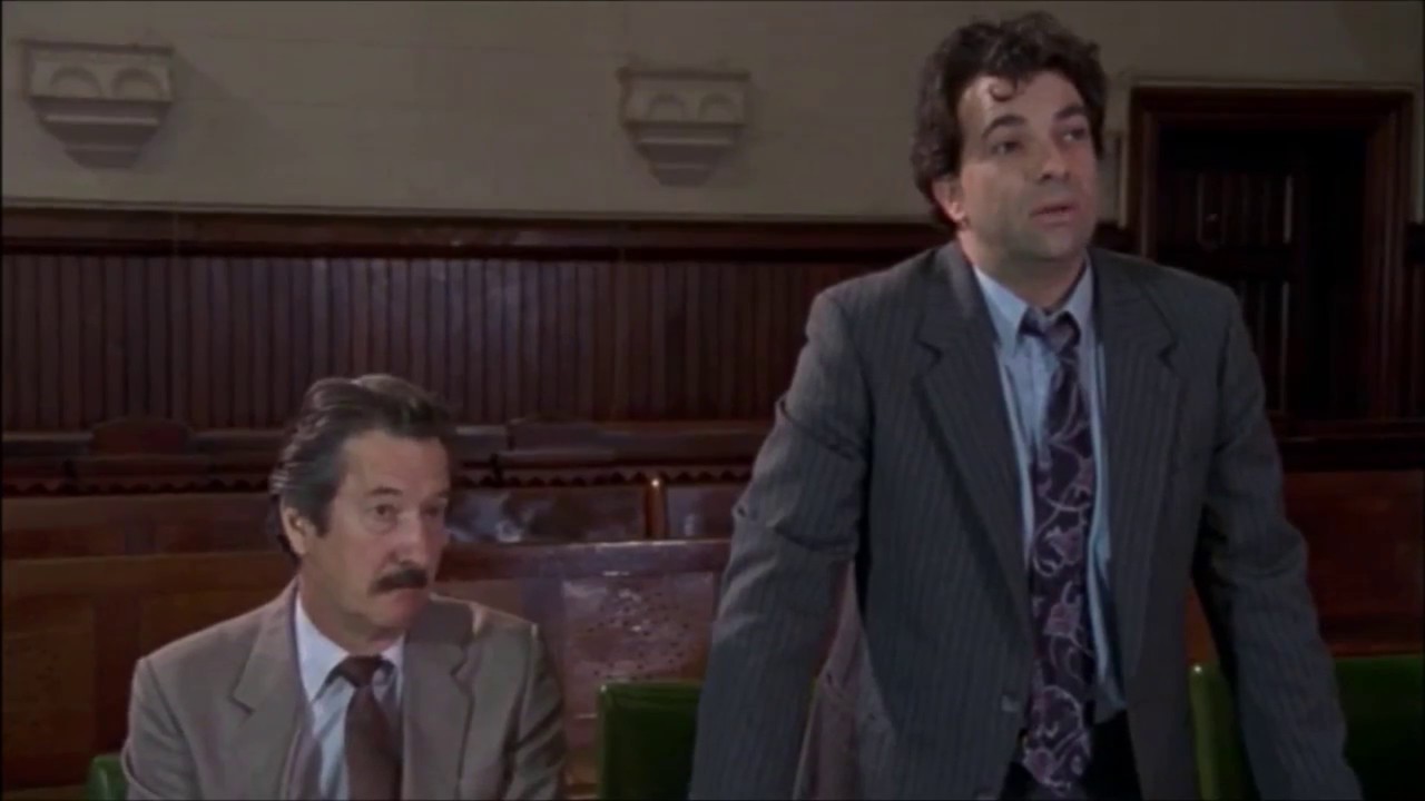 Dennis Denuto arguing in court in The Castle